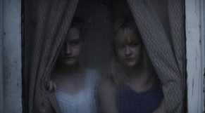 Window - Julia Garner (Rose) and Ambyr Childers (Iris) in WE ARE WHAT WE ARE, Credit - Ryan Samul